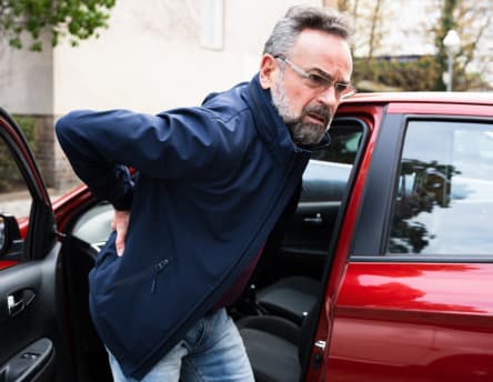 Image of a man Car Accident Chiropractic Care Franklin Tennessee Low Back Pain