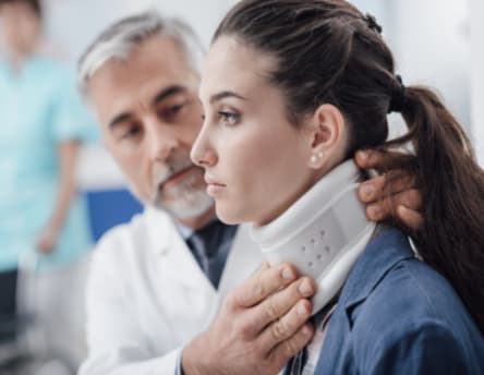Imageof whiplash patient with soft whie neck collar